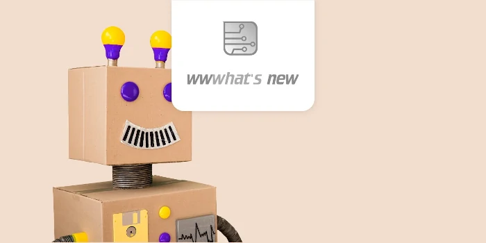 un robot de cartón y logo de wwwhatsnew