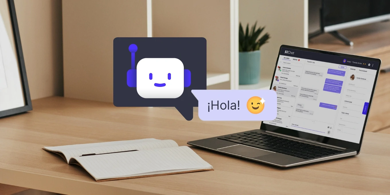 escritorio con laptop mostrando un emoji y un chatbot